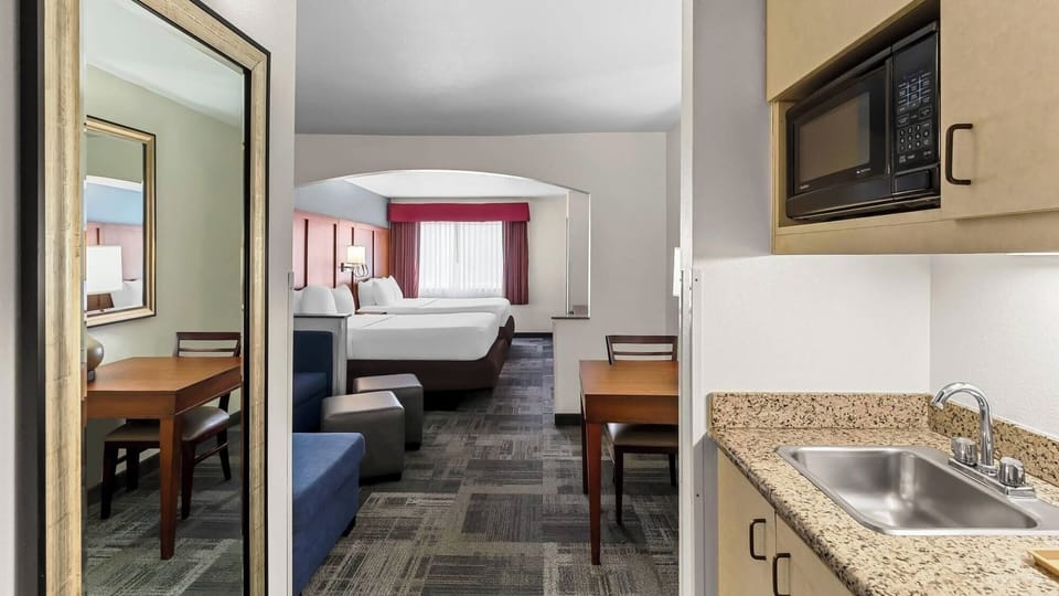 Enjoy simple meals at the table beside the handy kitchenette.