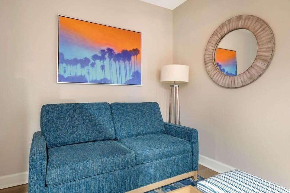 Sink into plush seating under warm lighting for movie nights.