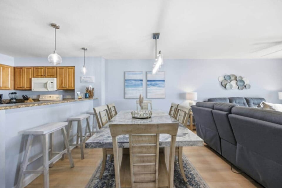 Dining area with seating for six plus additional bar seating