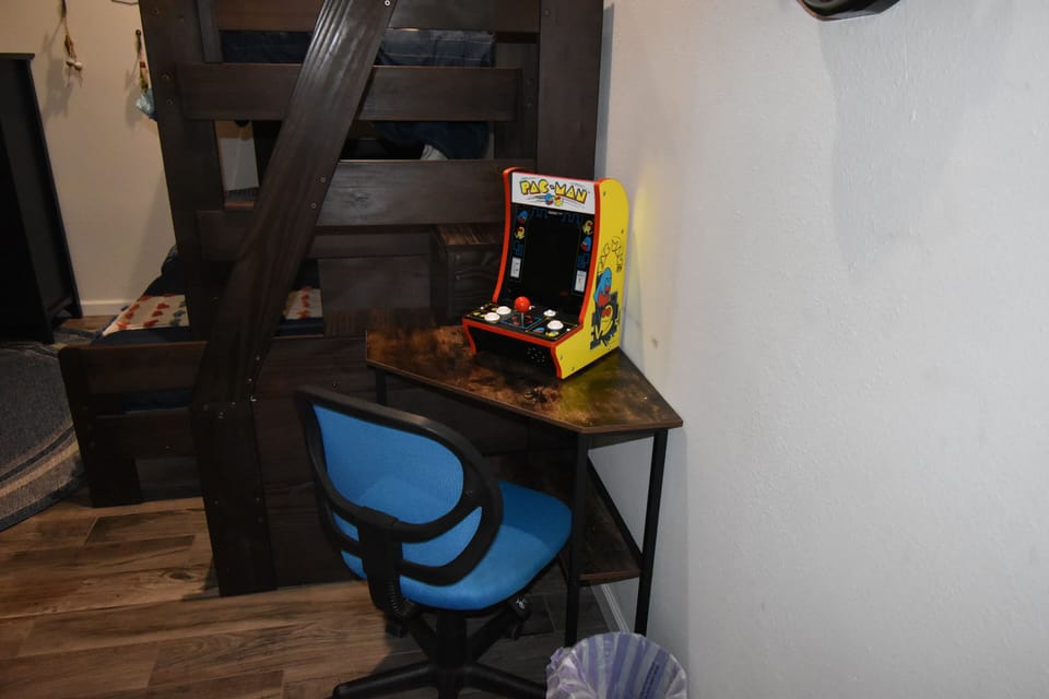 Features 2 bunk beds; the bottom mattress is a full and the top is a twin,  