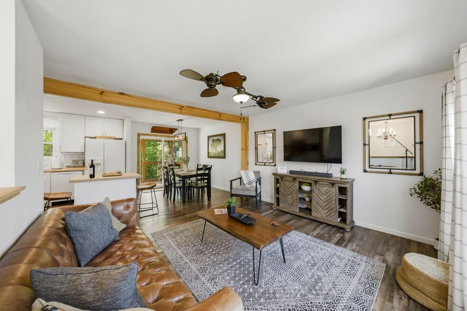 Bright Living Space | Sunlit Windows & Leather Sofa | Relaxed Everyday Comfort