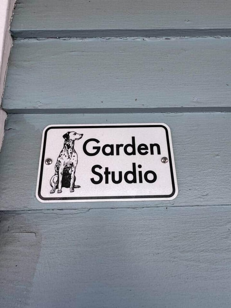 Sign showing the “Garden Studio”. We are dog friendly. 
