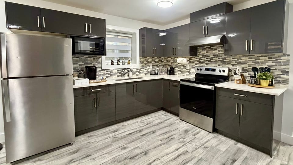 Fully equipped kitchen with all stainless steel top notch appliances. Plenty of dishwares, cups, cutlery, glasses, cookwares. 
Rice cooker, microwave, oven, toaster, blender, coffee maker and water kettle also available. 