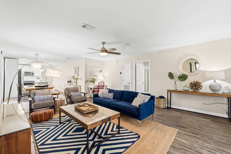 Contemporary furniture and chic design elements give this space both beauty and comfort in every room.