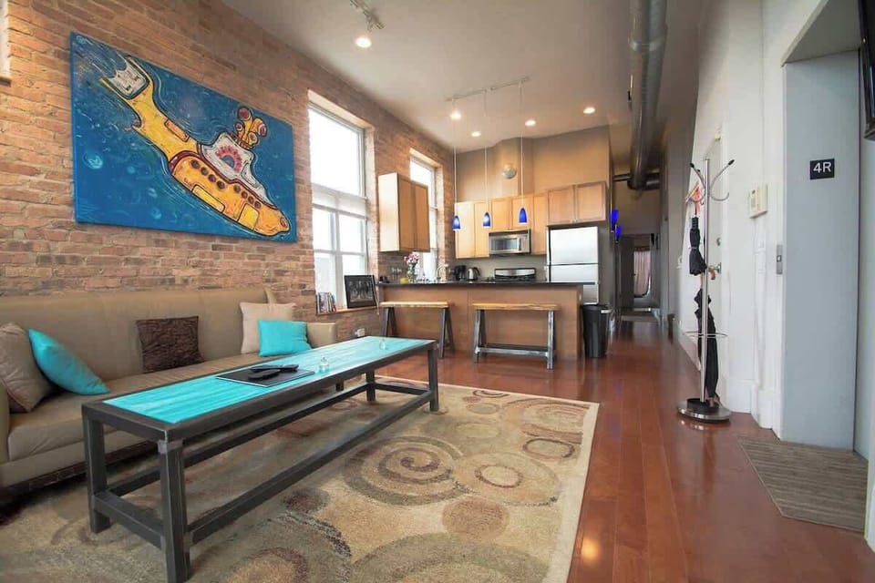 Open living room view connecting seamlessly to the kitchen for easy gathering.