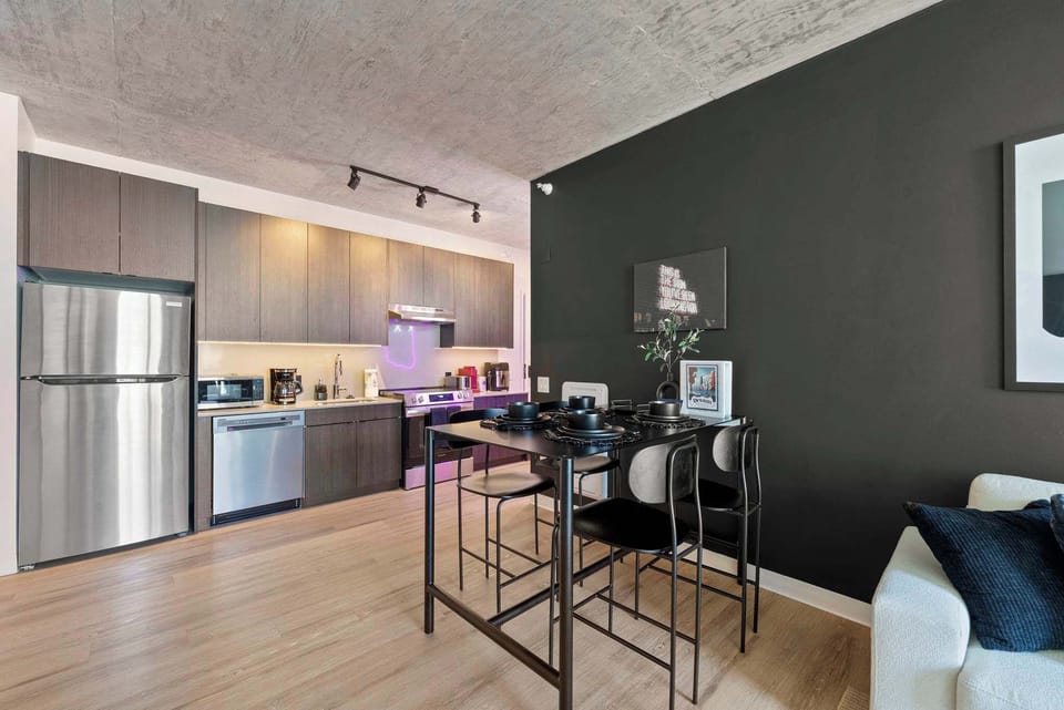 Contemporary dining area w/ clean lines, open flow, & modern finishes.