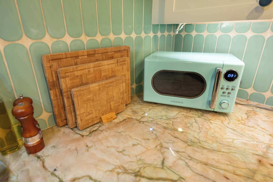 Microwave and essentials are ready for quick breakfasts or late-night snacks