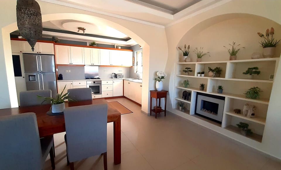 Dining area and kitchen in Main House