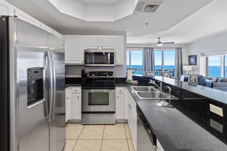Your fully equipped kitchen features granite counters and stainless appliances, with breathtaking ocean views while you cook.