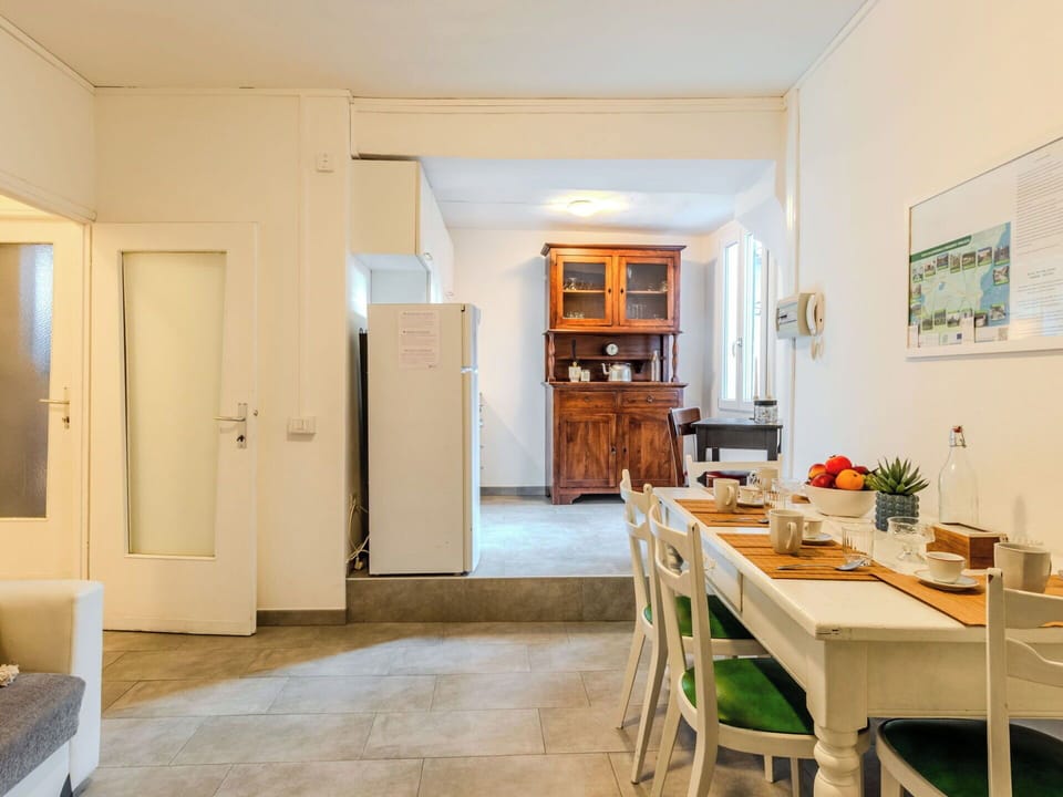 Furniture, Interior Design, Flooring, Wood, Floor, Ceiling, Room, Table, Lighting, Apartment