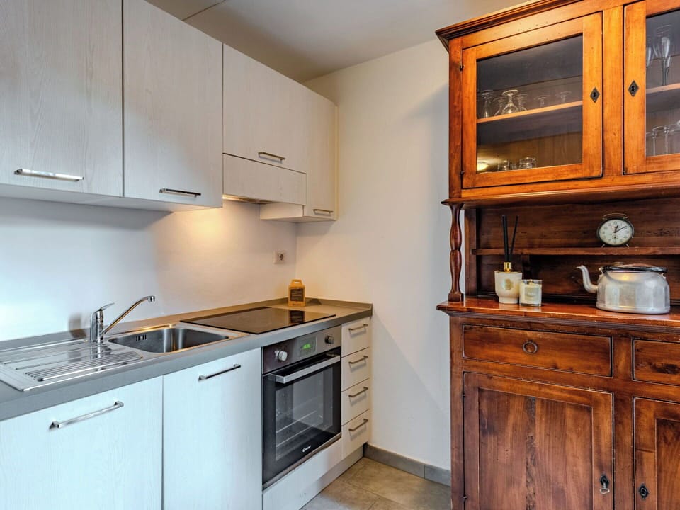 Cabinetry, Countertop, Kitchen, Furniture, Kitchen Appliance, Wood, Interior Design, Flooring, Major Appliance, Cupboard