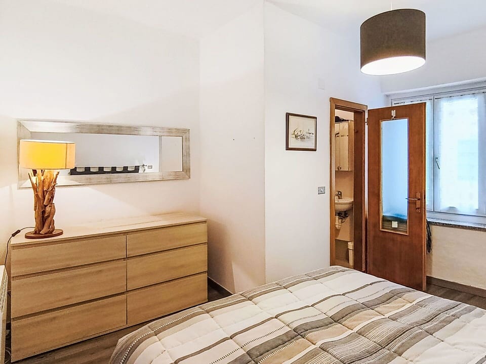 Furniture, Bed, Interior Design, Bedroom, Wall, Flooring, Floor, Wood, Bedding, Room