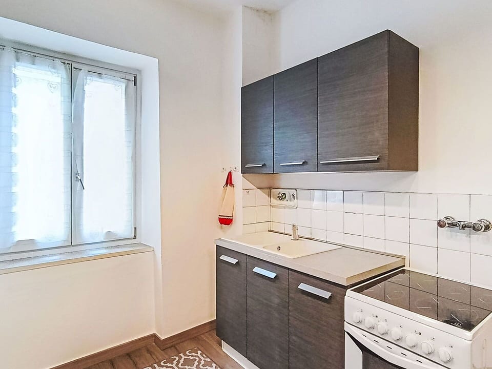 Flooring, Countertop, Wood, Kitchen, Major Appliance, Cabinetry, Interior Design, Floor, Kitchen Appliance, Kitchen Sink