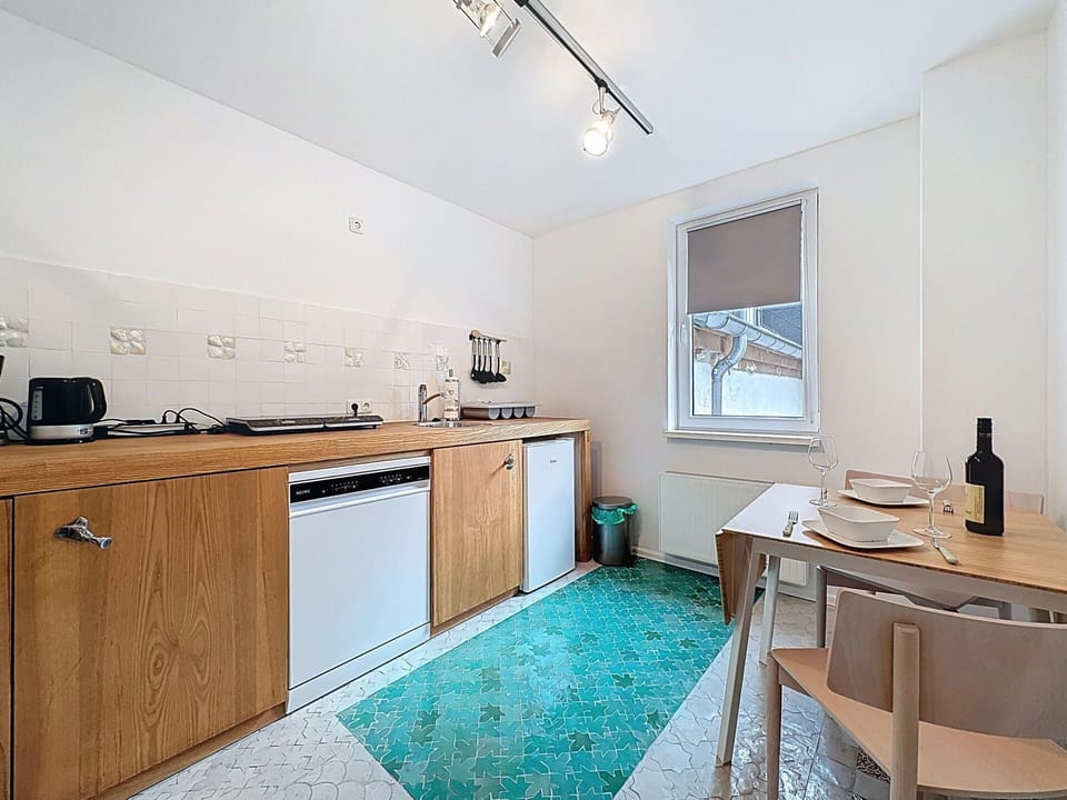 Flooring, Wood, Major Appliance, Floor, Interior Design, Ceiling, Countertop, Kitchen, Furniture, Lighting