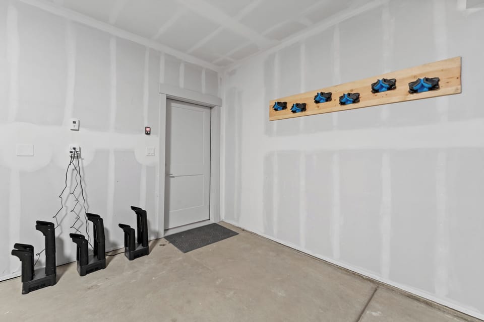 Private 2-car garage with gear storage and boot dryers.