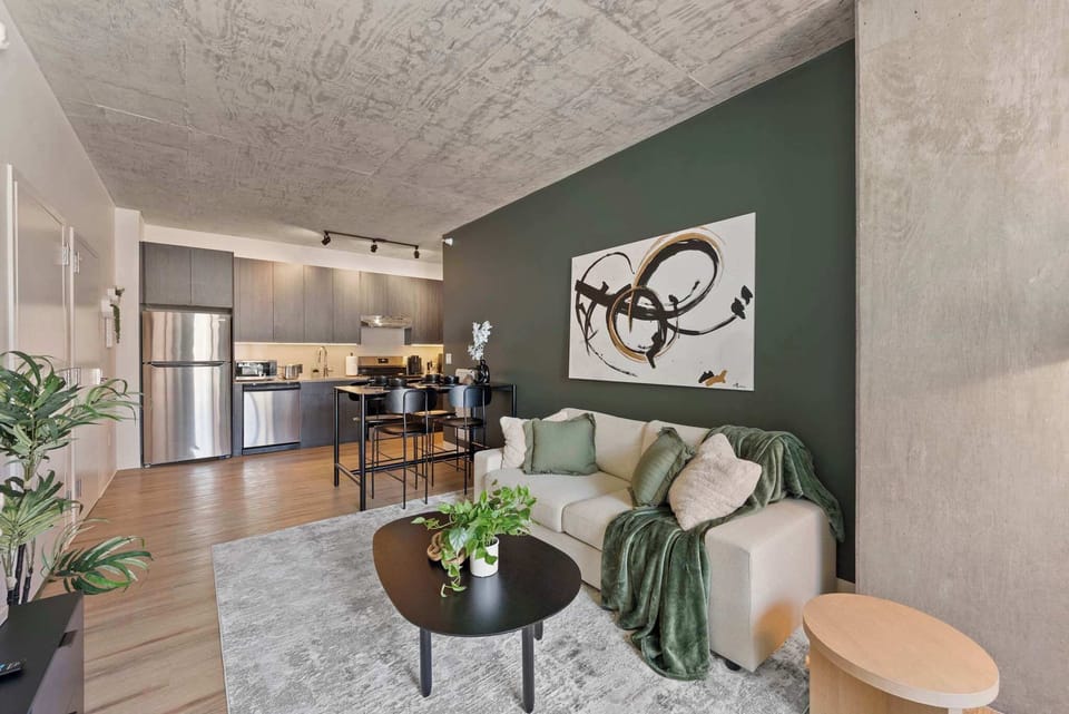 Dining area paired w/ greenery and soft light, creating a fresh and pleasant setting.