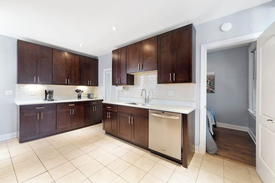 Fully equipped kitchen w/ modern cabinetry & sleek countertops