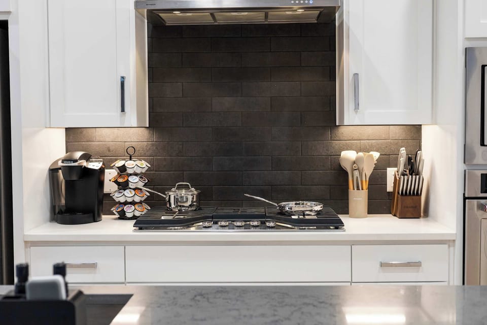 Cook with confidence in a fully equipped kitchen stocked with modern appliances and everything you need for quick breakfasts or full family dinners.