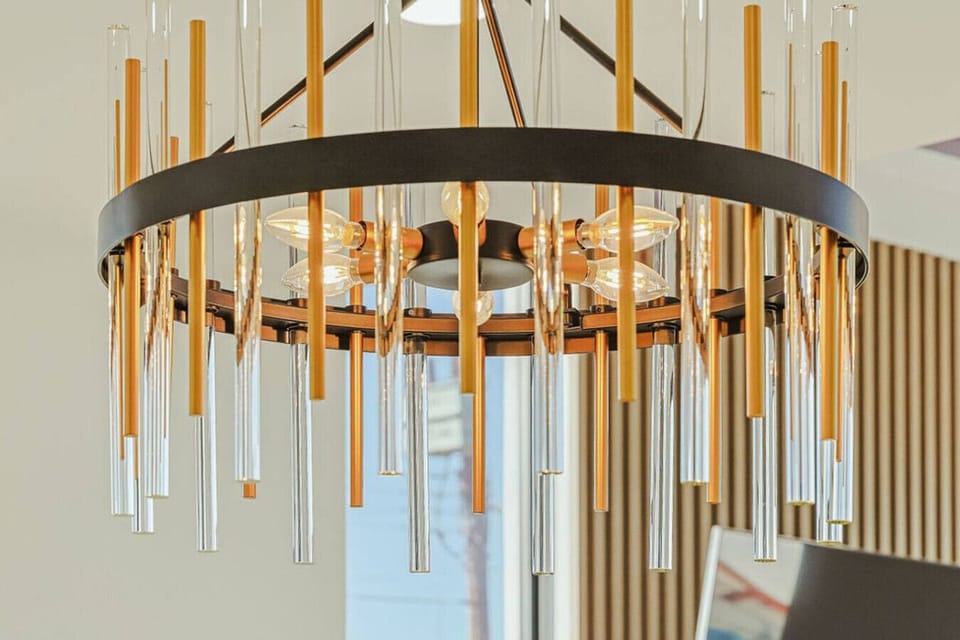 Modern Statement Chandelier with Elegant Gold Accents and Sleek Design—Adding a Touch of Luxury and Sophistication