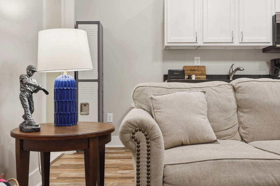 Unit 3 Living Area: Relax in this cozy living space with kitchenette, perfect for unwinding after exploring Churchill Downs and Louisville’s top eateries nearby.