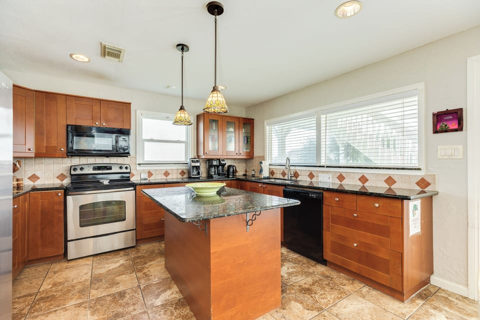 Fully equipped kitchen with stainless steel appliances