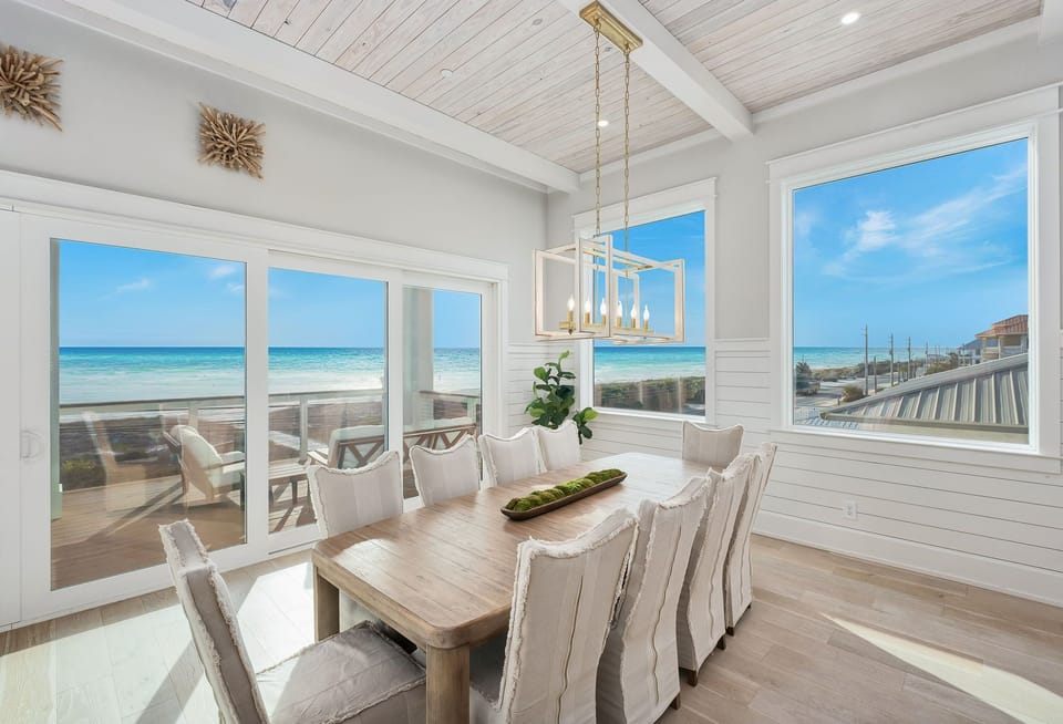 Gather around this stunning dining table where panoramic ocean views create the perfect backdrop for your memorable meals together.