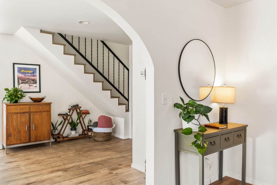 Sitting area looking at stairs to bedrooms