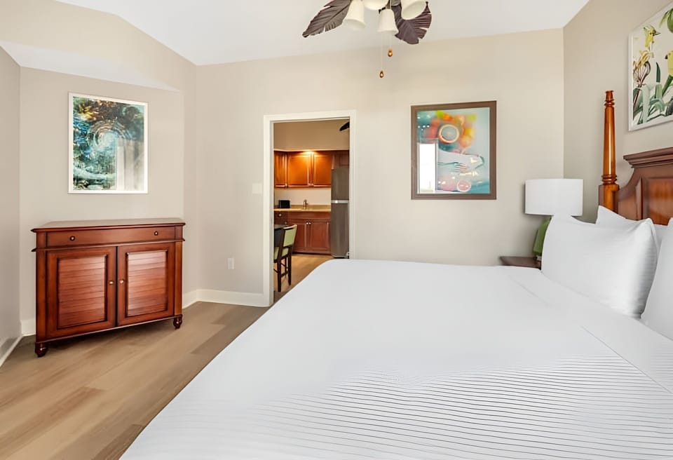 Stretch out on crisp linens with easy access to the kitchen.