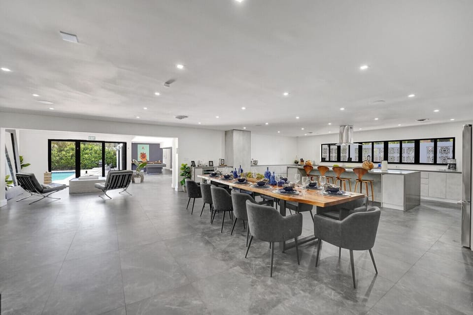 Spacious Dining Area with Seating for 11 and Wine Cooler