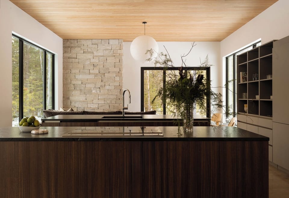 Chef-inspired kitchen featuring premium Miele appliances and sleek modern lines.