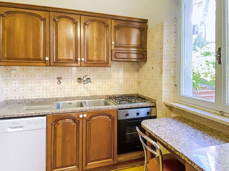 Kitchen, Countertop, Kitchen Appliance, Major Appliance, Wood, Interior Design, Cabinetry, Flooring, Kitchen Sink, Floor