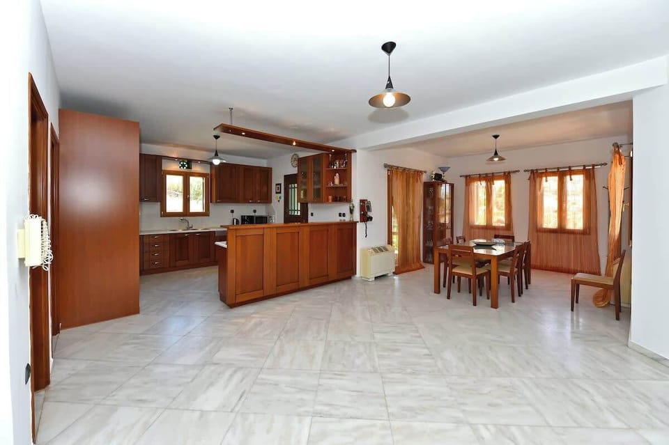 Dining Area with Large Table and Garden Views