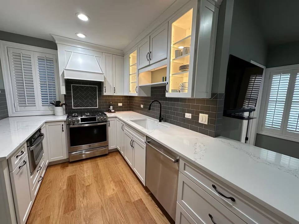 New kitchen with Quart counter tops. Pantry. Custom shelving for glasses & wine