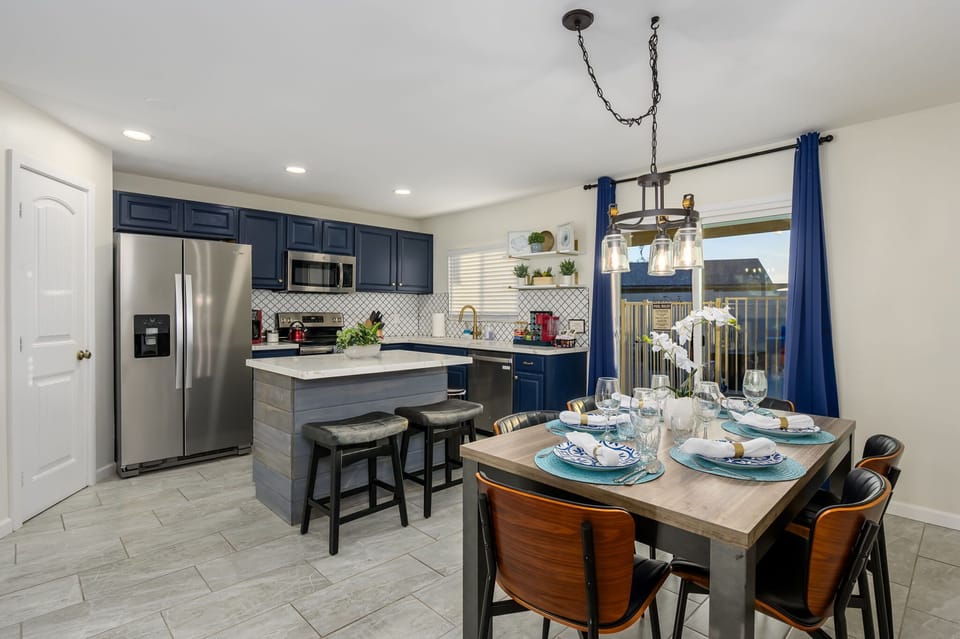 Open kitchen and dining area perfect for preparing and enjoying meals together.