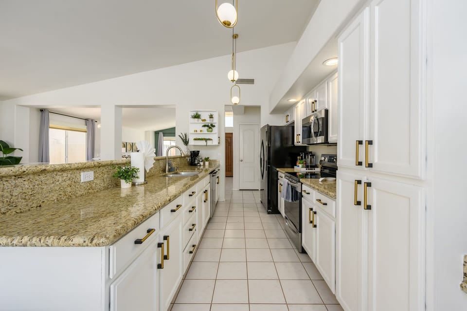 Kitchen with ample counter space to prepare meals for the whole group.