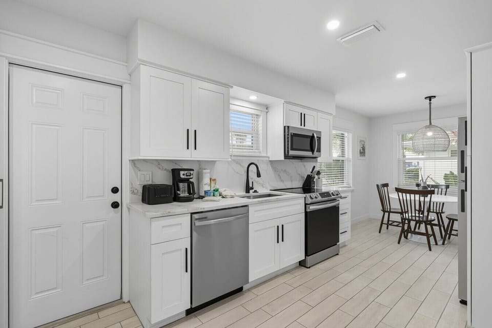 fully stocked galley kitchen in front facing unit
