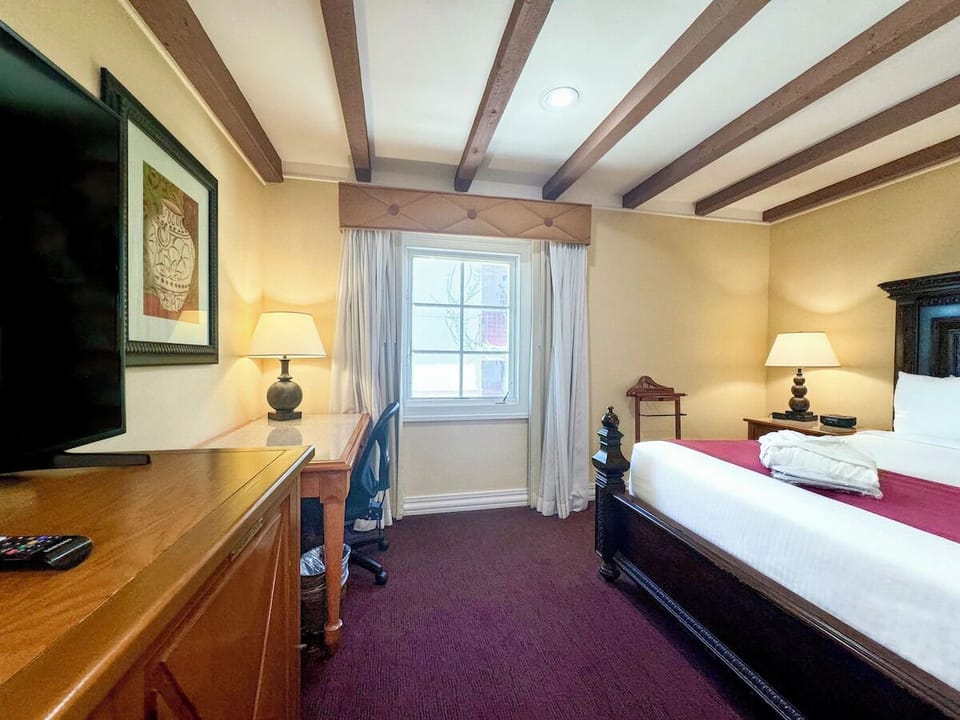 Settle in with a dedicated desk and relaxing bedroom ambiance.