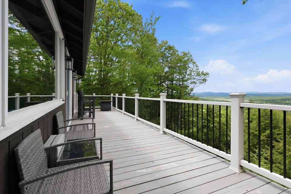 The expansive deck offers a comfortable place to relax throughout the day.