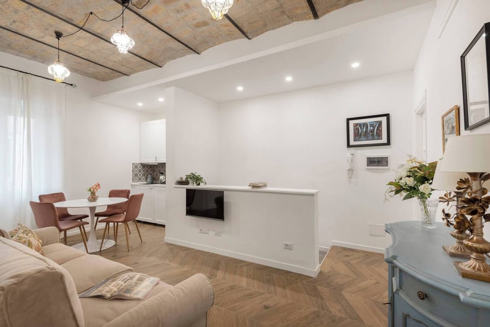 Sitting room with area for dinning and kitchen.