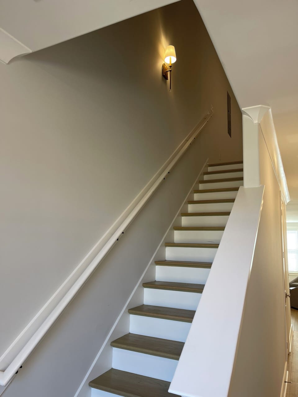 Stairs from main level hallway to upper level