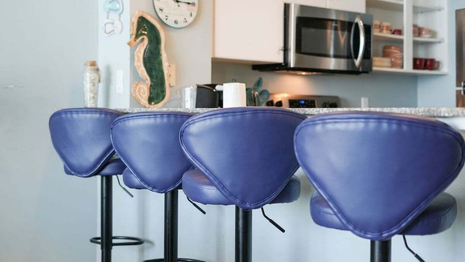 Four barstools at the bar