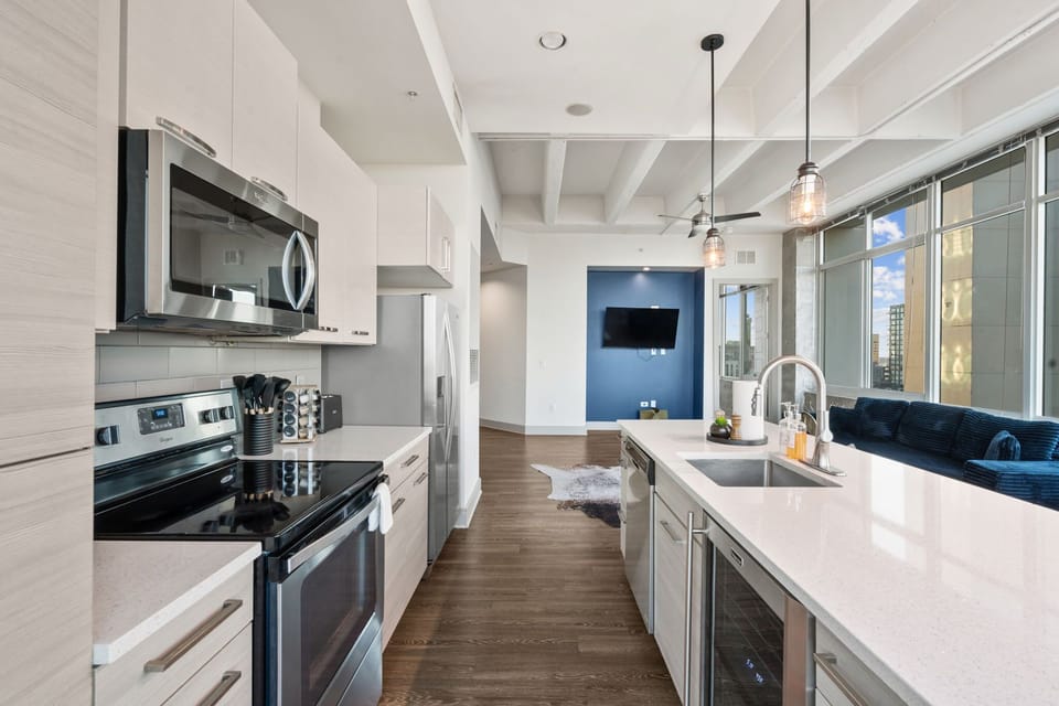 Designed for comfort and convenience, this kitchen supports both short and extended stays. Modern appliances and generous counter space make daily routines, meal prep, and entertaining easy and stress free.