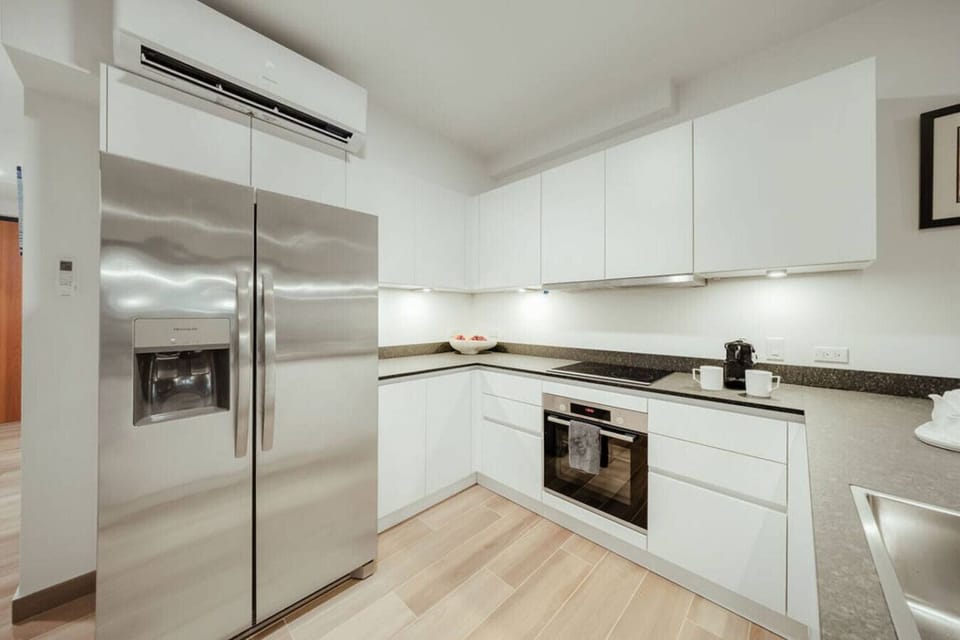A bright, modern kitchen with everything you need—from your first morning espresso to a full home-cooked dinner.