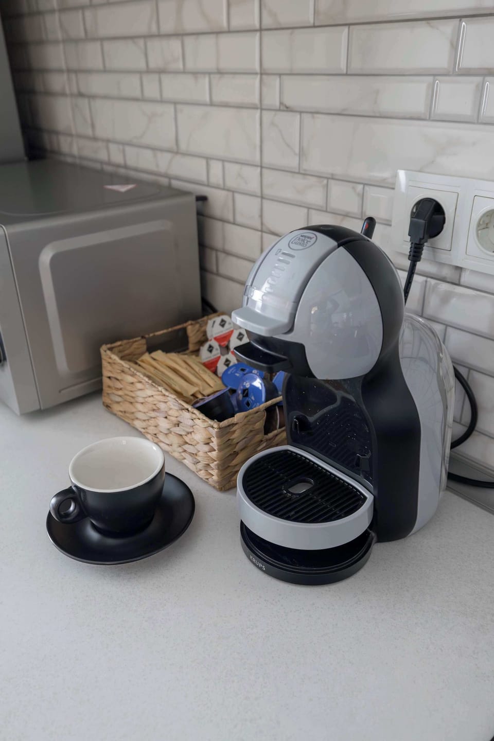 Coffee pods provided, together with sugar, chocolates and milk. 
