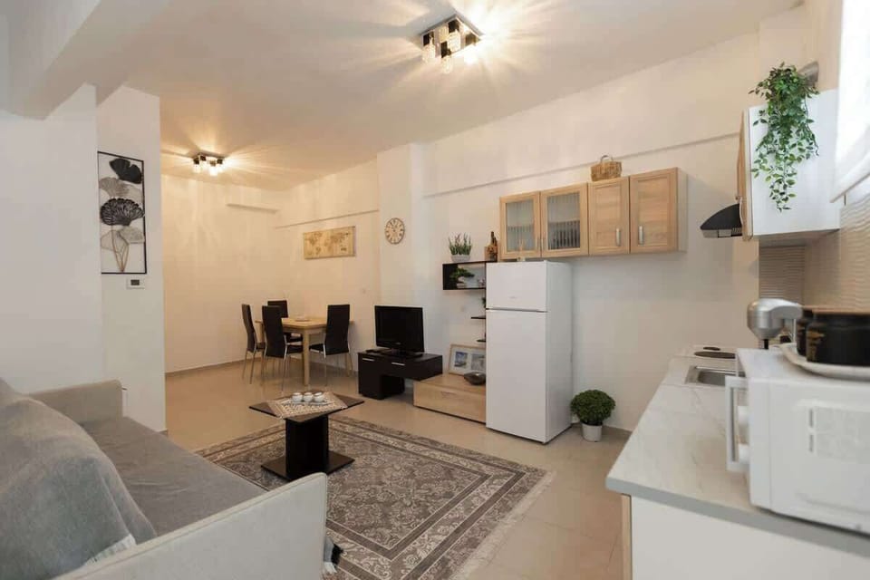 Spacious lounge and dining space with modern décor.