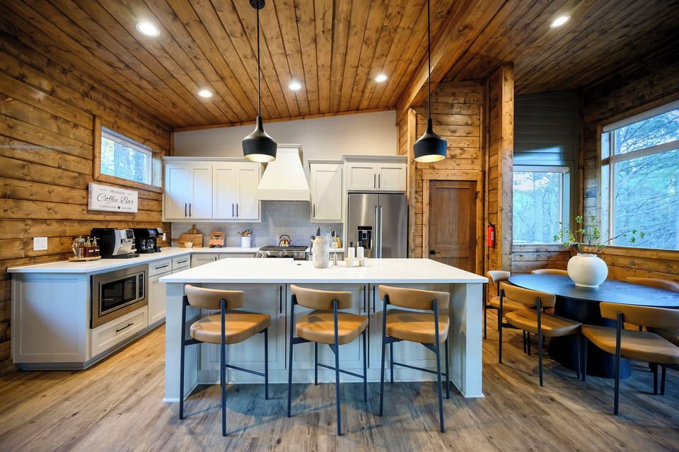 Chef's kitchen + dining for 9 — not your average cabin kitchen