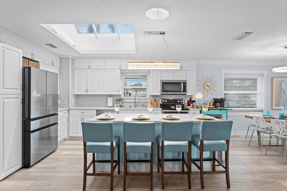 Gourmet Kitchen: Bright and airy, with modern appliances and stylish seating for culinary adventures!