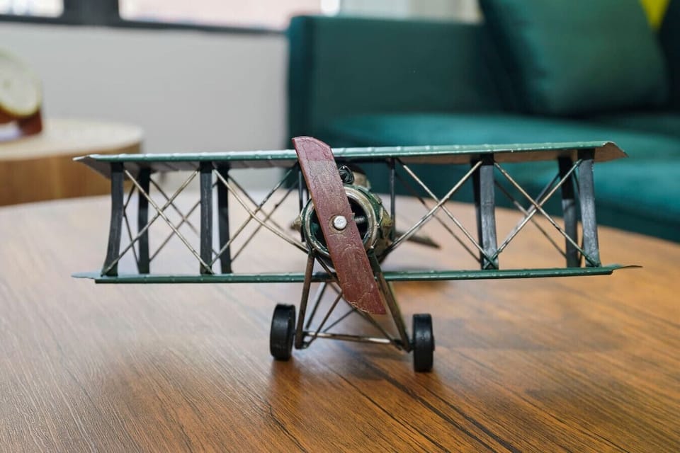 A fun vintage airplane accent that adds charm and personality to the space