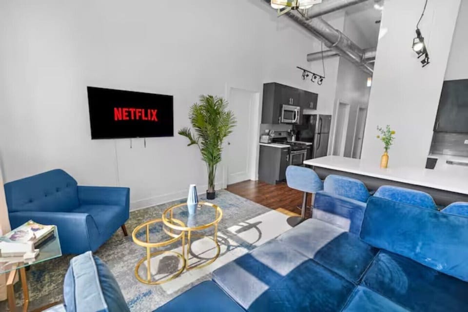 Open-concept loft: lounge, dine, and stream with ease