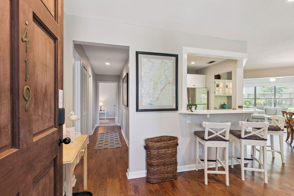 Welcoming coastal-inspired entryway leads you into an open, light-filled layout where you can unwind and feel right at home.